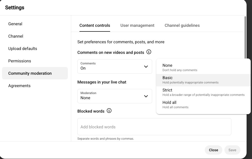 The Moderation dropdown in YouTube Studio Content controls, open, showing four options with descriptions: None (Don't hold any comments), Basic (Hold potentially inappropriate comments), Strict (Hold a broader range of potentially inappropriate comments) and Hold all (Hold all comments). Basic is currently selected.
